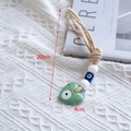 Green heart Evil Eye ornament with jute rope and beads, 20cm total length - Green Heart