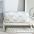 Quilted white pencil case featuring blue bow pattern and ribbon zipper pull - White Background Blue Bow