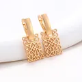 Elegant gold hollow rectangular earrings with intricate geometric filigree pattern - Rectangular Hollow Drop / Gold