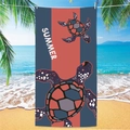 Detail of sea turtle print beach towel hanging by the ocean with Summer text - Sea Turtle Beach Towel 20