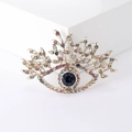 Artistic evil eye brooch with colorful crystals and silver branch-shaped metal accents - Coffee (MM-BR-2479-Coffee-BR)