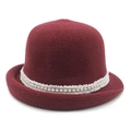 Detailed view of burgundy knit cloche hat featuring white lace trim and pearl accents - M (56-58cm) / Burgundy