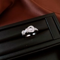 Macro shot of adjustable silver belt buckle ring with sparkling rectangular zircons - 32# Belt Buckle Shape Open Design