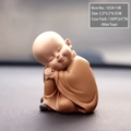 Miniature zen monk crystal ornament in apricot robe sleeping pose, 5.5x4.5x6.5cm - 1034-15B Mini Leaning on Knee