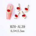 Macro shot of 3D gold snake nail charms with red gemstone inlay, size 6.5x15.5mm - Gold Snake Style With Red Gemstone (AL39)