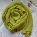 Close-up of lime green silk scarf with detailed chiffon crepe texture and elegant pearls - Matcha Green / 160x50cm