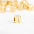Macro view of a 18k gold plated cube pendant with zircon inlaid letter I detail - I (Single Pendant)
