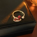 Close-up of golden rocking horse ring with red enamel and sparkling diamonds details - Red Rocking Horse Style (6# Ring-Gold)
