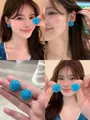 Macro view of handmade sky blue crystal bead cluster earrings on model for summer look - 16# 925 Sterling Silver Earring Post-Blue-Crystal Beaded Ball (HE24970)