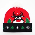 Christmas knit beanie in red and black featuring reindeer, snowflakes, and a white pompom - Hat Style 33 (Red Black White Reindeer Tree)