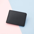 Slim black lychee grain PU leather card holder with dual slots and elegant stitching - Black