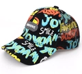 Kids black baseball cap with vibrant yellow graffiti and breathable mesh back - SMILE Print / Black Mesh Curved Brim