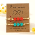 Pinky Promise evil eye gold bead bracelets set with red and blue heart charms - PINKY PROMISE Gold Bead Heart Set (JS-S24110504A-P)