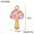 Pink and gold mushroom charm with enamel dots measuring 1.8cm tall and 1.1cm wide - Pink