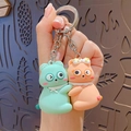 Süßes Shiba Inu Pärchen-Schlüsselanhänger-Set in Mintgrün und Pfirsich-Orange aus Silikon - Magnetischer Bär Pärchen Schlüsselanhänger - Orange Cyan