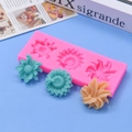 Pink 3-hole floral silicone mold with detailed flower shapes for DIY cake baking decoration - Pink