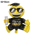 Detail of graduation balloon shaped like a graduate with doctor cap and Way to go GRAD text - Sitting Graduation Doctor Bear