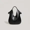 Minimalist black large capacity hobo tote bag with unique knotted woven handle detail - Black