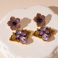 Detail of vintage gold earrings with purple crystal flowers and butterfly drops - Silver Pin - Purple Petal Drop Earrings / Purple/Gold