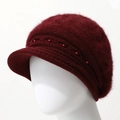 Detail of burgundy knit beanie with plush texture, short brim, and red pearl accents - One Size / Burgundy