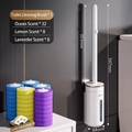 Wall-mounted disposable toilet brush set with 48 scented refills and storage base - Annual Supply: 1 Handle + 48 Mixed Heads (32 Ocean + 8 Lav + 8 Lem) + 1 Balm