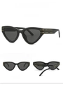 Detail view of black cat-eye sunglasses with gold accents shown from multiple angles - Black Frame Black Grey Lens
