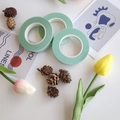 Set of 3 light green floral tapes for DIY flower making displayed with decorative props - 25 Cyan Green