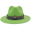 Close-up of bohemian fedora hat with turquoise stone beads and colorful tassel decor - Fruit Green