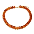 Collier vintage en perles acryliques ambrées cylindriques avec fermoir doré poli - Collier / Or Ambre