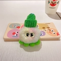 Rosa-weißer Plüsch-Monster-Anhänger mit grüner Strickmütze und vier weichen Füßen - Bunter Oktopus-Grün