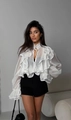 Detail of white ruffle tiered sleeves and sheer chiffon fabric on lace V-neck blouse - S / White