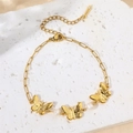 Golden stainless steel bracelet with three butterfly charms and elegant white pearls - Gold Butterfly Pearl Style