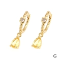 Detail of 18K gold plated hoop earrings with pear-shaped yellow zircon drop charms - Yellow Teardrop (ER1138)