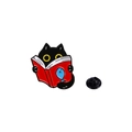 Cute black cat enamel pin reading a red book with a blue fish icon on a white background - Black Cat Reading Red Book