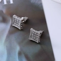 Macro shot of silver square stud earrings with pave-set zircon stones and side diamond detail - D10 Silver Luxury Square