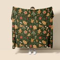 Detail of Christmas flannel blanket with gingerbread man and reindeer festive patterns - Style 23 (Christmas Green Elements)