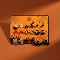 Detail of Halloween earring set featuring ghosts pumpkins and bats on an orange card - DE8807