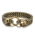 Punk style skull bracelet in antique brass finish with braided steel chain - 22cm / Antique Gold