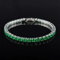 Macro detail of silver tennis bracelet featuring round cut green emerald-style zircons - 4mm-17cm / Green Zirconia