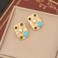Macro shot of gold hammered earrings featuring pearls, turquoise, and colorful gemstones - 2# Green Stud Earrings