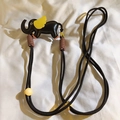 Detail of a cute elephant leather phone lanyard with woven strap and colorful beads - Back Clip + Long Strap / Black