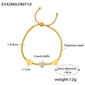 Elegante bracciale a serpente in acciaio al titanio dorato con cuore di cristallo - Oro