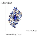 Alloy rhinestone brooch with large glass stones and size specs 10.2cm by 6.8cm - Blue