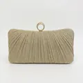 Champagne gold pleated evening clutch bag with sequined texture and rhinestone ring clasp - Champagne Gold