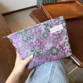 Floral canvas makeup bag in purple with green and pink patterns for travel - Dark Purple Daisy