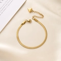 Elegant gold-plated stainless steel snake chain bracelet with heart charm on silk background - Anklet / Gold
