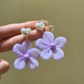 Detailed view of purple mesh flower earrings with heart-shaped pearl studs - Heart Pearl Flower Style / Purple