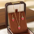 Golden titanium steel necklace and earrings set featuring red enamel strawberry pendants - Gold Enamel Red Strawberry Set (KS225993-Z)