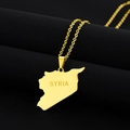 Detail of gold Syria map pendant necklace featuring a polished finish on black texture - Engraved A (SYRIA) / Gold