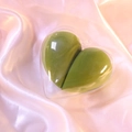 Green heart-shaped makeup sponge in transparent heart box on pink silk background - Matcha Green Heart/OPP Bag